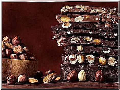 Energy homemade chocolate with cocoa, coconut, maca and nuts