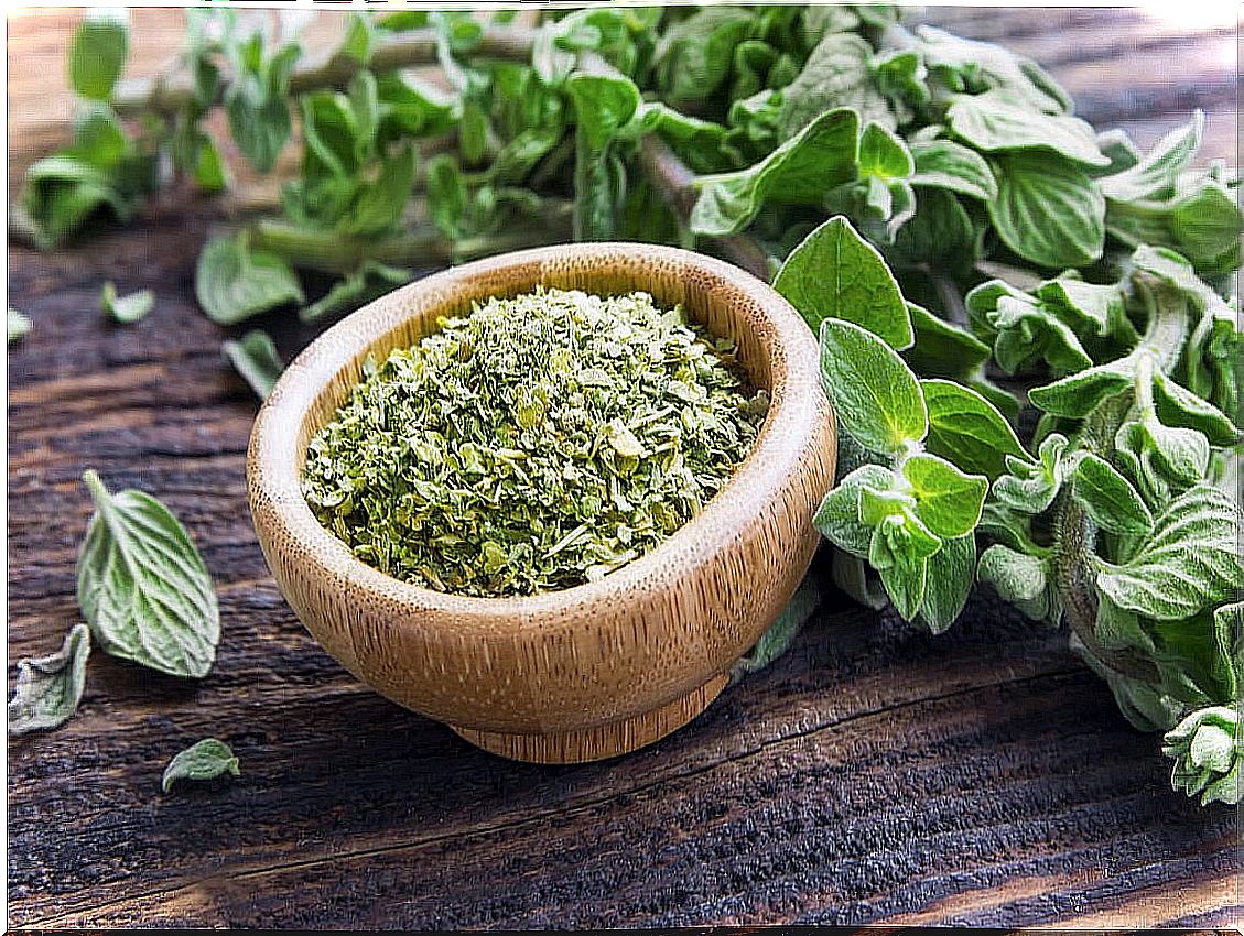 Crushed oregano in pot.