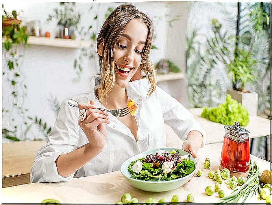 Woman eating a salad